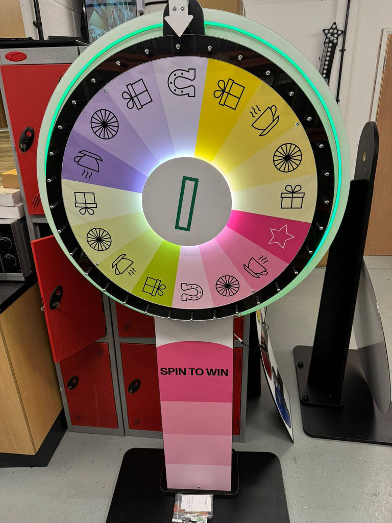 Illuminated spin the wheel games