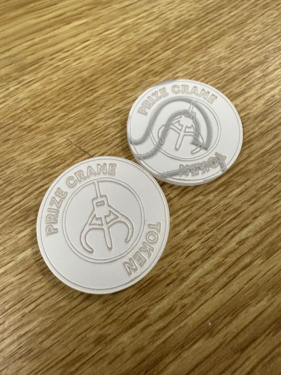 Prize crane token custom logo
